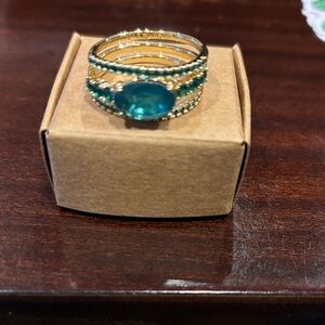 May 2025: Emerald on Gold!